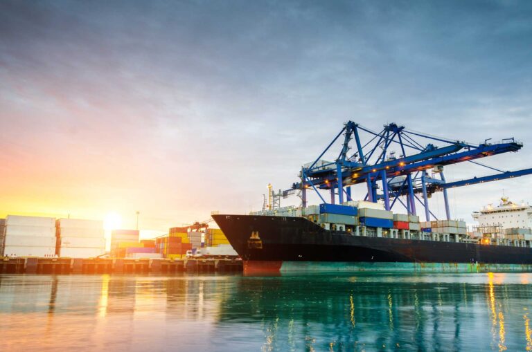 Cargo ship at a ship loading facility